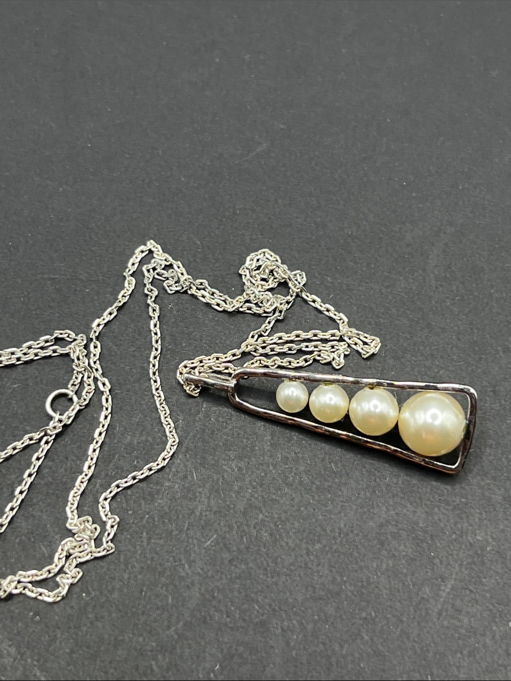 Sterling silver graduated faux pearl pendant on 18 inch sterling silver chain